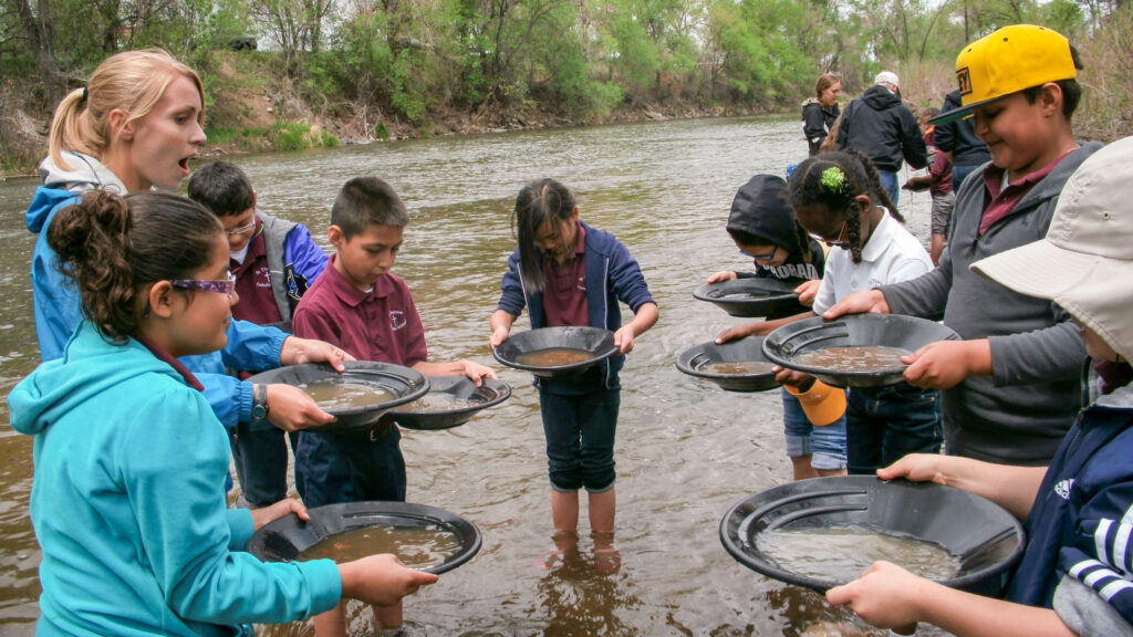 SPREE students pan for gold at Grant Frontier Park on a field trip.