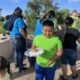 Participant eating at the My Outdoor Colorado Family Campout